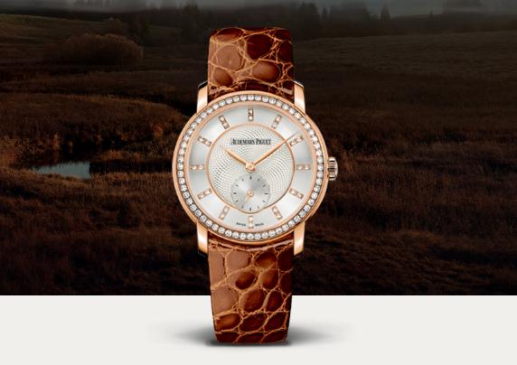 The 18k rose gold copy watches are decorated with diamonds.